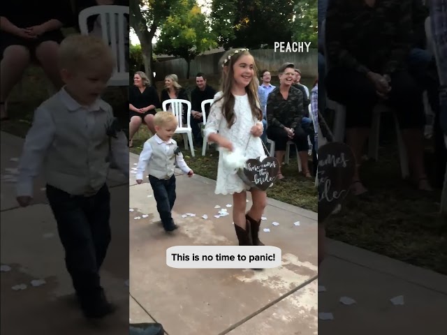 Love that he's against littering 🌸 #flowers #flowergirl #ringboy #weddings #shorts
