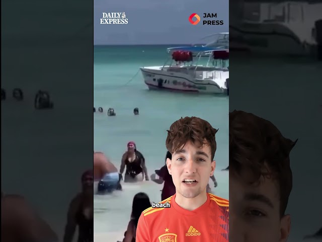 Man 'hits wife' on packed beach before onlookers pull him away and pummel him in sea 😱  #news